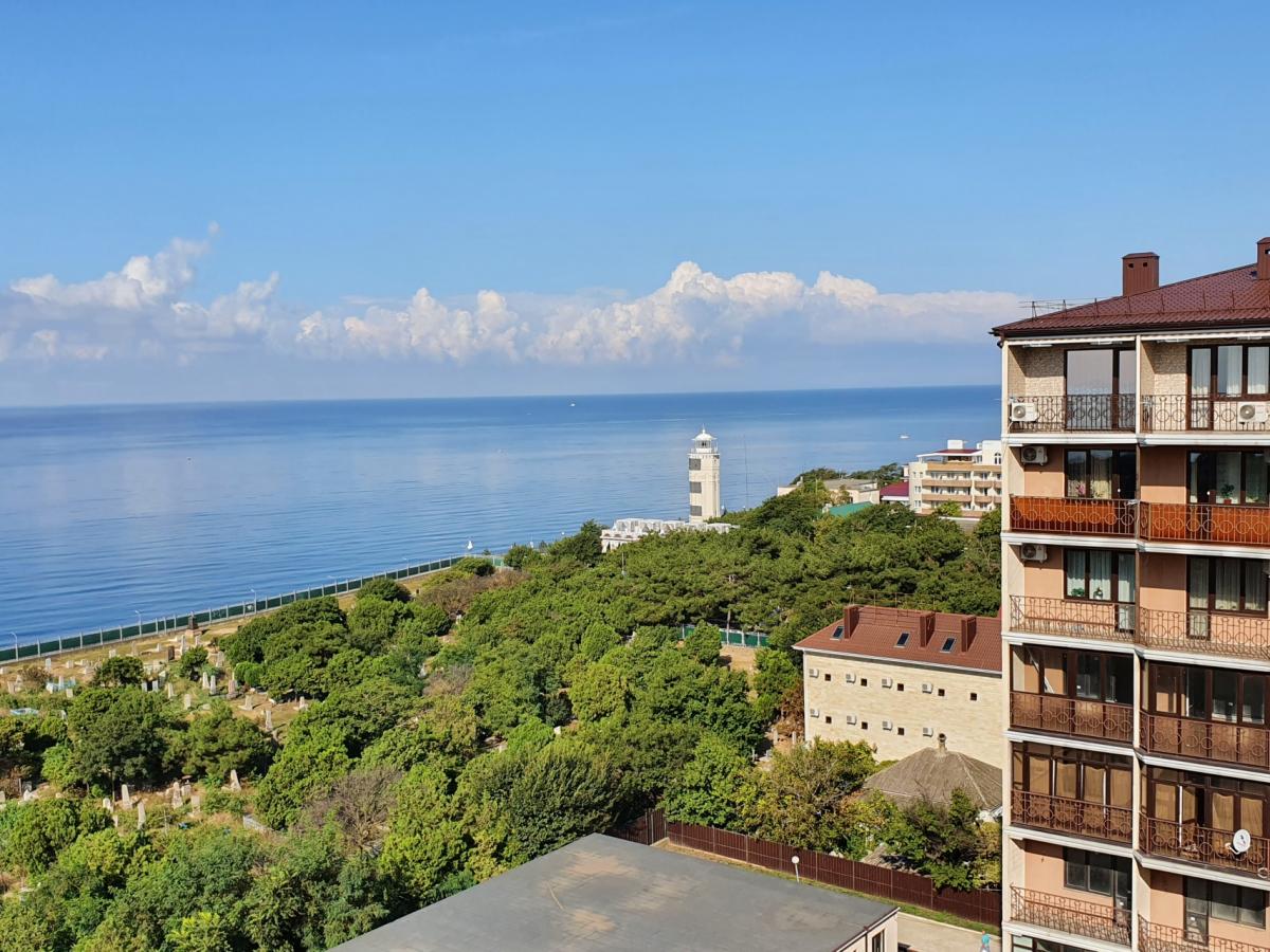 Квартира с видом на море и маяк.